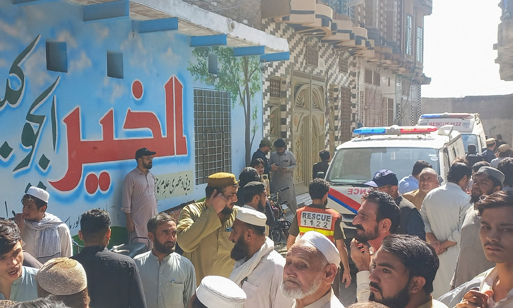 How did the shcool roof collapse, and who is responsible for the incident?